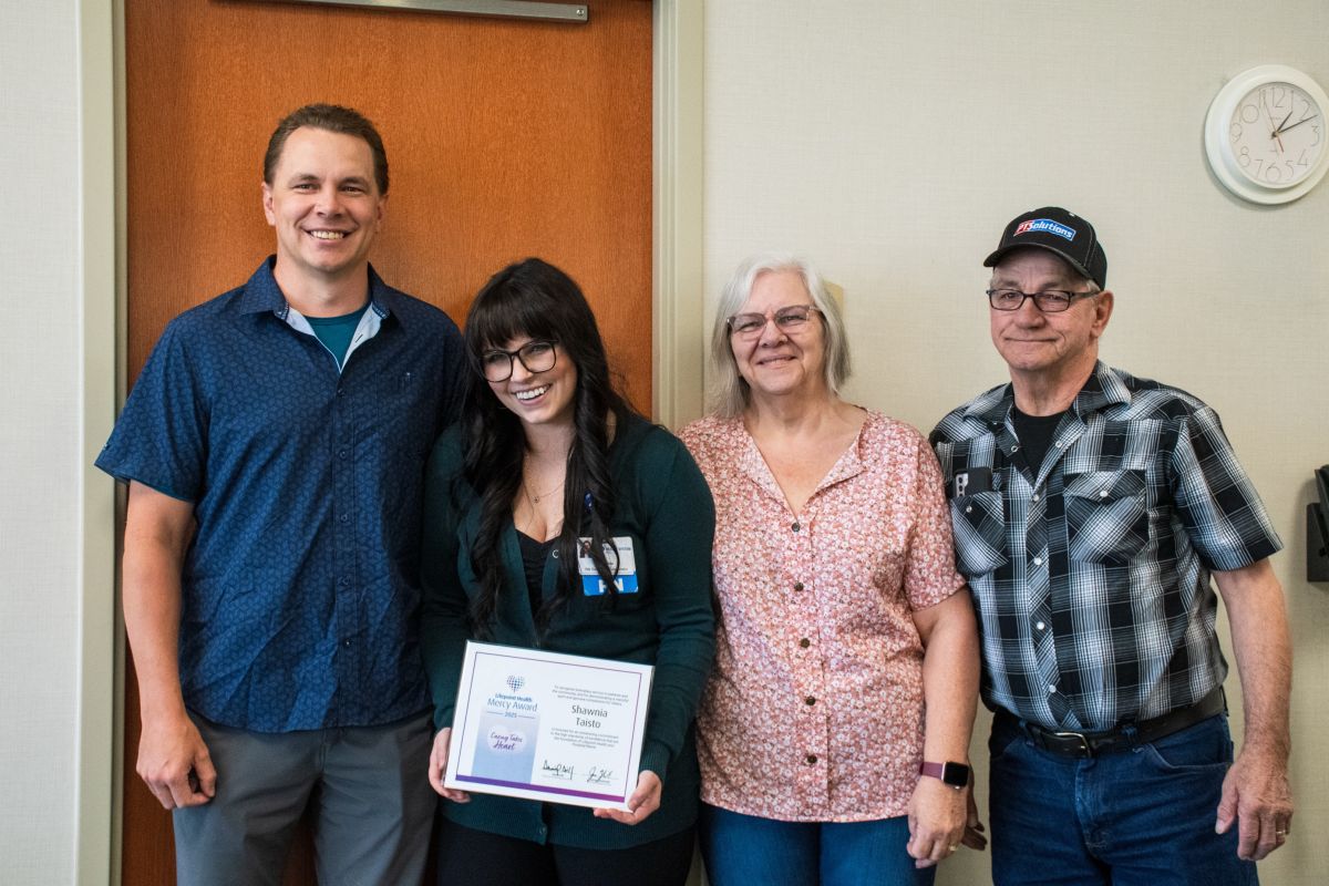 2025 Mercy Award Winner Shawnia Taisto with family